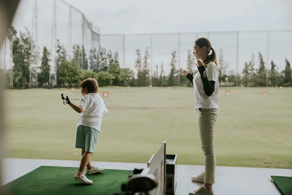 Golf lesson at driving range